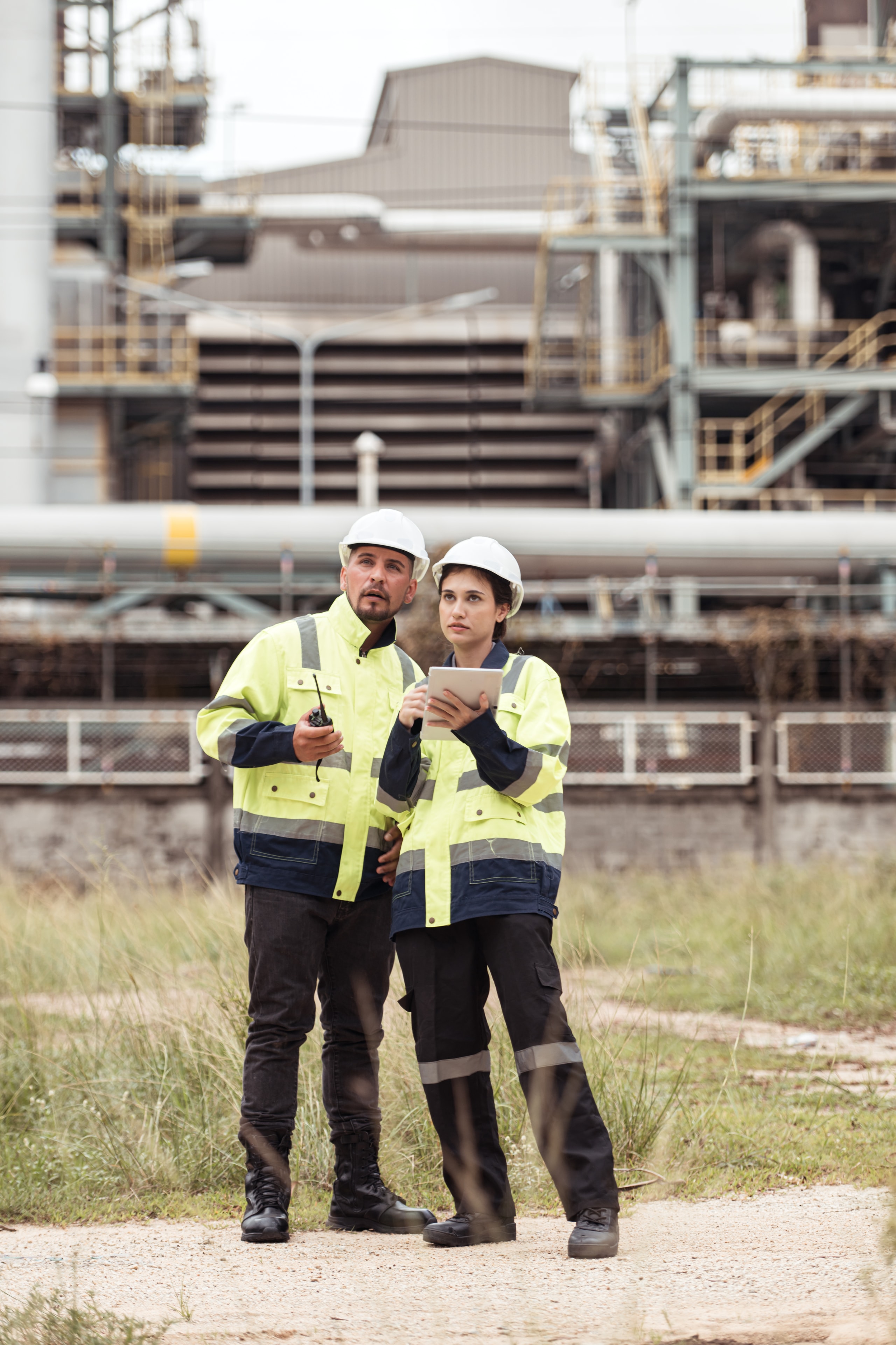Petroleum engineers inspecting oil and gas operations